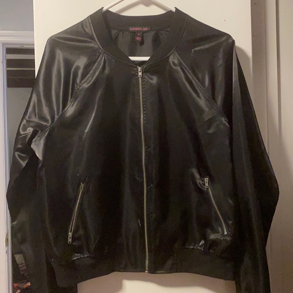 Black biker jacket with writing on back size XL